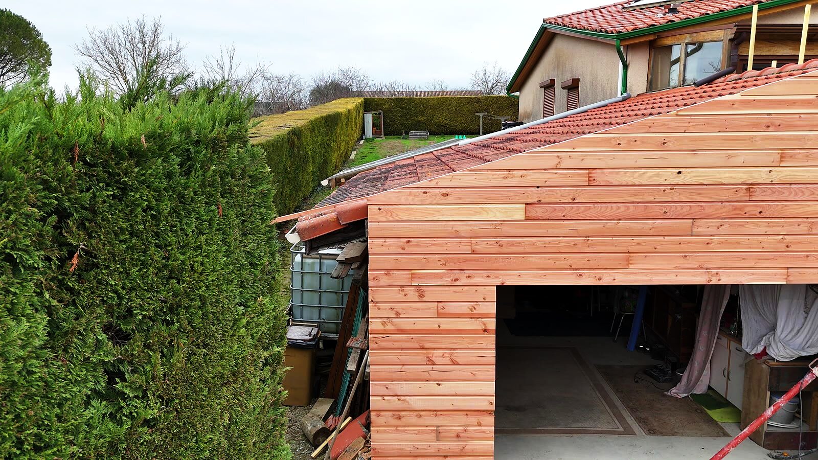 Bardage bois douglas sur carport / extension