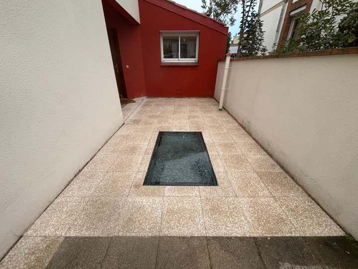 Étanchéité de terrasse et pose de dalles sur plots